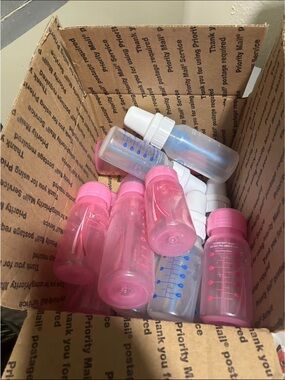 Dr. Browns Pink & Clear Feeding Bottles With All Nipple Sizes
